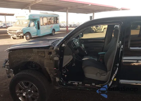 2012 Toyota Tacoma Base V6 z USA, uszkodzony, nr VIN 3TMLU4ENXCM086299